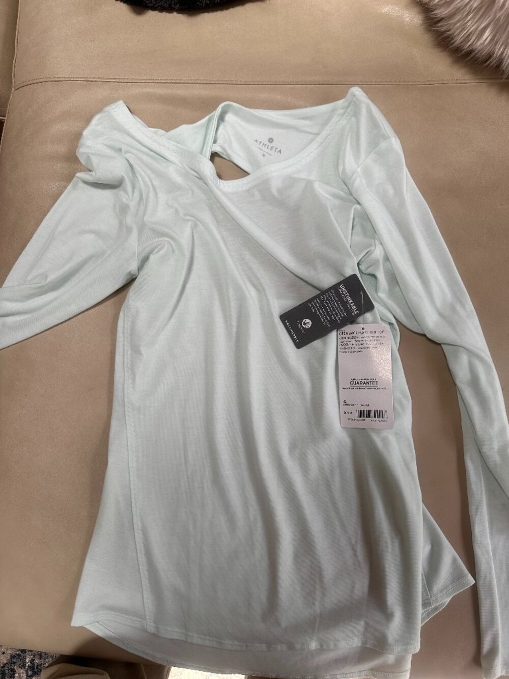 NWT Athleta women's "Open Back Flexlight Top".  Pale green.  Small